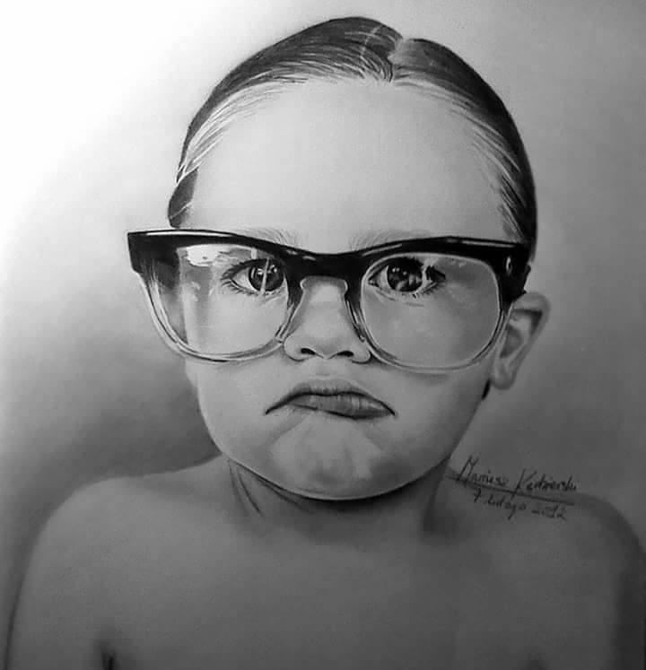 رسوم واقعية لفنان بدون ذراعين 