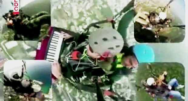 بالفيديو فكرة جنونية..فرقة تعزف النشيد الوطني في الهواء الطلق