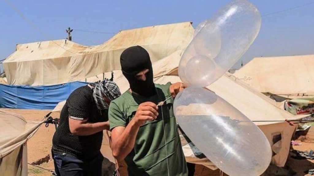 العدو يوقف شاحنات تحمل آلاف البالونات في طريقها إلى غزة